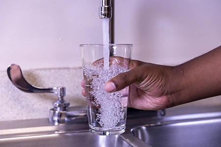 Water from a tap to put on a victims skin.